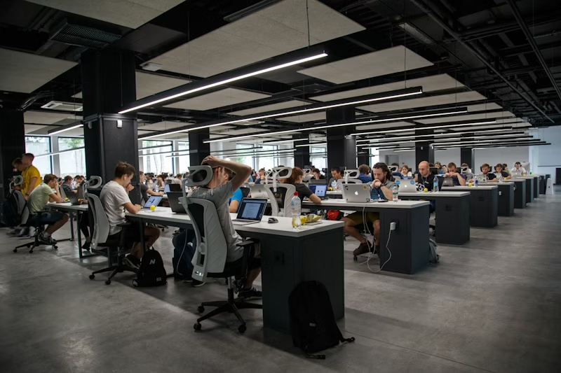 People working at desks in an open office